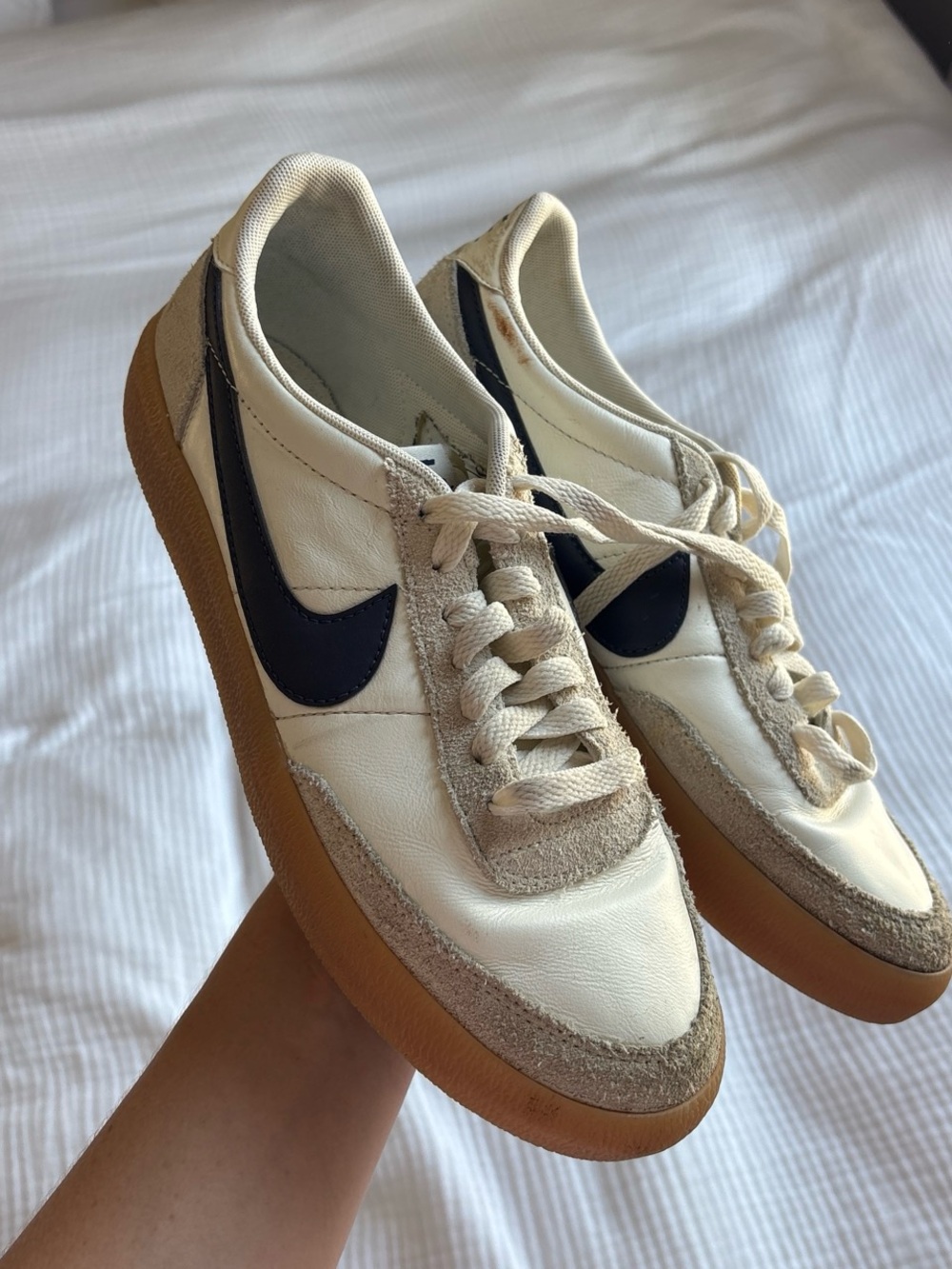 Nike Women's Low-Top Sneakers in Cream with Black Swoosh